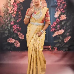 A full-length view of a bride in a beautiful golden Kanjeevaram saree. My complete service includes makeup, hair, and saree draping to ensure a cohesive and stunning look.