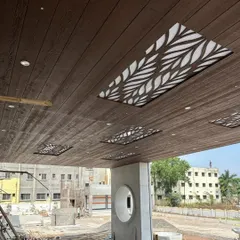 A stunning exterior ceiling featuring our wooden cladding with integrated backlit jaali panels. This design adds a decorative touch and provides beautiful ambient lighting.