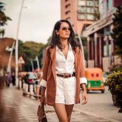 On the move in Bengaluru. As a global artist, I'm constantly traveling for gigs, and my style reflects a life that blends work, fashion, and ambition.