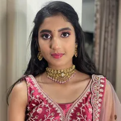Here is the lovely Neha, ready for her event. I created this party look with shimmery pink eyeshadow, glossy lips, and a half-up hairstyle.