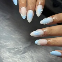 Soft blues and seashell vibes. This design features a blue ombre, 3D shells, and delicate pearl accents.