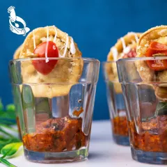 Another view of our Crispy Stuffed Ravioli appetizer. The combination of the crunchy exterior, cheesy filling, and tangy tomato sauce makes it an instant favorite.