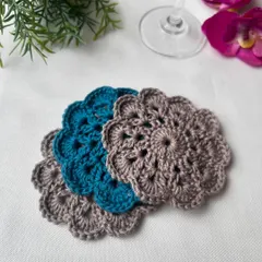 This coaster set shows a lovely color combination of muted grey and a striking teal. I can create sets with one standout color or a mix of your favorite shades.