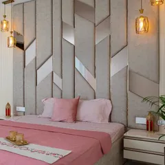 From this angle, you can see the interplay of light and texture on the headboard and the fluted wall panel. Every detail is chosen to contribute to a feeling of refined comfort.