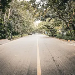 The empty roads of Delhi on a Sunday morning, our playground for a long, sweaty run. This is the path to progress.