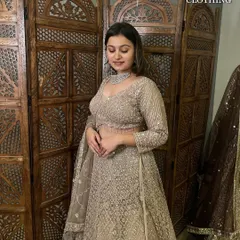 Another angle of this gorgeous beige lehenga, showing how it catches the light.