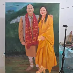 The completed 48 by 36-inch commissioned couple portrait. My focus was on creating a realistic depiction, paying close attention to the traditional attire and the warm interaction between the subjects.