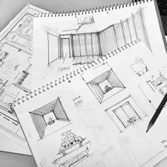 A look at the architect's sketchbook, filled with impromptu perspective drawings and design iterations. This is where the first seeds of a project are planted and explored.