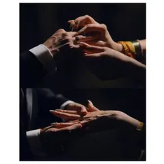 A close-up of the ring exchange. This shot is all about the hands and the rings, symbolizing the promise being made in a simple, powerful way.