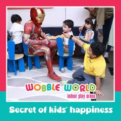 The secret to kids' happiness? A party with their favorite superhero! Iron Man makes a special appearance to interact with the children.