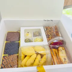 This is how I do festive gifting. My Rakhi hamper is a complete celebration in a box, featuring fudgy brownies, assorted gourmet truffles, crunchy biscotti, and buttery Indian cookies, all packed and ready to delight your sibling.