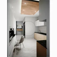 A minimalist parallel kitchen design with handleless cabinets and a wooden ceiling feature. The layout is clean and efficient, with a small seating area at the end for a quick breakfast.