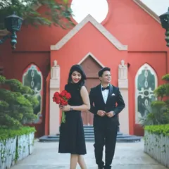 A chic and elegant pre-wedding shoot with the couple in formal wear, perfect for an urban love story.