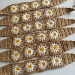 My new crochet daisy headbands are perfect for a bohemian or cottagecore look. The repeating granny square pattern is so charming and beautiful.