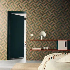 A bold geometric pattern from the Intuition collection, featuring a 3D-effect woven design. The natural cork-like texture and deep green color add a sophisticated and organic feel to this bedroom.