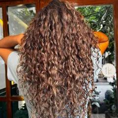 You don't have to cover your greys, you can blend them beautifully. This is a perfect example of how we use subtle coloring techniques to work with your natural grey hair, creating a stunning, multi-dimensional look.