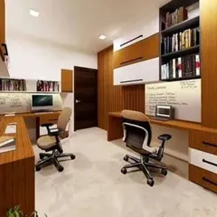We designed this home office for two, with separate desk spaces to ensure a productive environment. The room is equipped with extensive shelving and a large whiteboard, making it a fully functional workspace for professionals.
