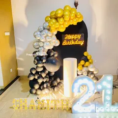 My 21st birthday decorations range from bold and modern to soft and elegant. I use marquee numbers, custom backdrops, and sophisticated balloon arrangements to mark this special occasion.