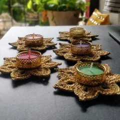 My golden tea light holders set up on a balcony table, creating a perfect ambiance for a quiet evening.