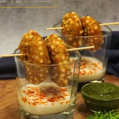 A modern take on a classic snack, these are my Sabudana Vada pops served over a spiced yogurt dip. I love reinventing traditional Indian snacks into easy-to-eat canapés for parties.