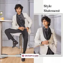 Confidence is your best accessory, and a great suit is your armor. This crisp white and black tuxedo is an example of our commitment to timeless style and tailoring excellence for any black-tie event.