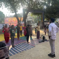 A group of students warming up during an outdoor class. We focus on correct posture and preparation before every session.