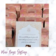 Mini bag gifting for a housewarming invitation. These cute, patterned bags are a simple yet stylish way to invite guests and give them a small token.