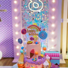 A cake fit for a princess. This colorful, candy-themed cake was the centerpiece of Ira's 8th birthday party. We always take detailed shots of the cake before it gets devoured.