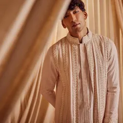 For this Kunal Anil Tanna campaign, I provided natural grooming to enhance the model's features under studio lighting. The look is clean and masculine, ensuring the focus remains on the designer's clothing.