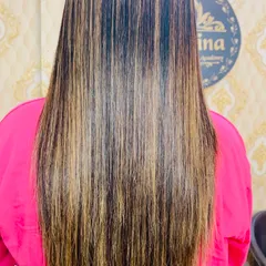 A beautiful example of balayage highlights on long hair. I used a blend of caramel and blonde tones to create a natural, sun-kissed effect that adds dimension without being high maintenance. The hair is also straightened to show the sleek finish.