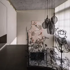 This is where art becomes an integral part of the architecture. This custom metal railing for a villa in Ahmedabad is a functional sculpture, with intricate, laser-cut silhouettes of local flora and fauna that create a dynamic play of light and shadow along the corridor.