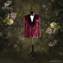For the groom who commands attention, I designed this striking three-piece tuxedo. The rich red velvet jacket, paired with a classic black satin lapel and bow tie, offers a bold and sophisticated look for a reception or formal event.