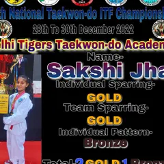 Sakshi Jha with her impressive medal haul from the nationals: two Golds for Individual and Team Sparring, and a Bronze for Individual Pattern. She is a powerful and versatile fighter.