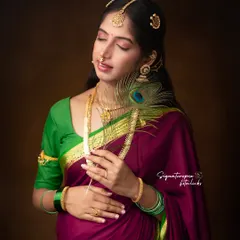 A serene portrait capturing the divine essence of motherhood, styled with a peacock feather to evoke grace and beauty.