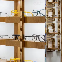 It's all in the details. This close-up shows the custom-designed display shelves, where each pair of glasses is presented like a piece of art.