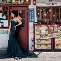 Shooting on the streets of Tokyo. I’m always looking for the lines, the strange shadows, and the contrast between high fashion and the raw energy of a city. We placed a model in a couture gown right in front of a local ramen shop to create a visual story that feels both jarring and beautiful.