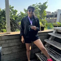 Another one of our athletes proudly showing off her marathon medal. We encourage our members to set goals both inside and outside the gym, and we support them every step of the way.