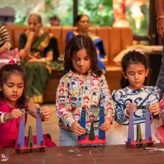 Deep in concentration, these young engineers assemble their rocket launchers. The activity is designed to be engaging and achievable, building confidence with every piece they connect.
