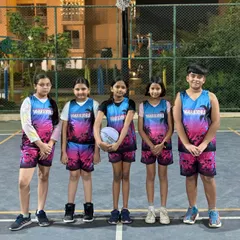 Our girls' team showing off their vibrant custom Warriors jerseys before a game.