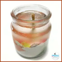 A creative gel candle with colorful layers, made in a simple glass jar. A perfect beginner-friendly craft project.