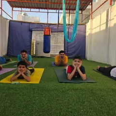 A fun moment with my students, including kids, in Crocodile pose. Yoga doesn't always have to be serious.