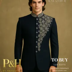 This angle highlights the sharp tailoring and structure of the navy blue Jodhpuri jacket, a hallmark of my bespoke services.