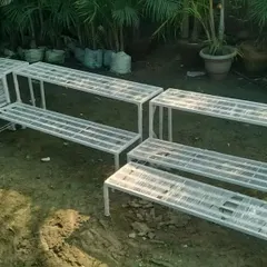 This is my 2-stair table design stand, available in different lengths. It's a simple and strong metal stand, perfect for arranging a line of pots along a wall or balcony. Order now for quick delivery in Ghaziabad and Noida.