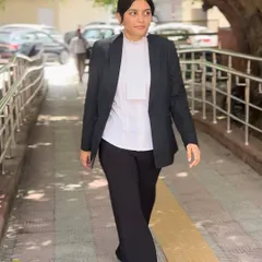 Walking with purpose towards the courtroom. My mentorship covers the practical aspects of litigation, including how to carry yourself with confidence even when you're facing a tough case.