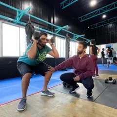 That look you give when the coach says "one more rep" for the fifth time. Our coaches are there to push you past your perceived limits while ensuring your form remains solid.
