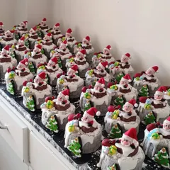 My entire kitchen counter filled with mini Santa-in-a-chimney cakes! These were part of a huge Christmas hamper order, and each one was individually handcrafted and decorated. It was a true Christmas marathon!