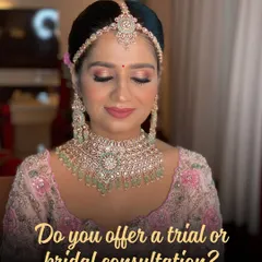 A soft and dreamy look for a bride's consultation or trial. This showcases a beautiful pastel pink outfit with complementary makeup, featuring a flawless base and gentle shimmer on the eyes.
