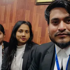 With colleagues during the election campaign at Karkardooma Court.