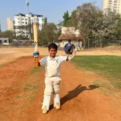 The pure joy of a match-winning performance. This young player celebrates after leading his team to victory, a moment that builds immense confidence and character.