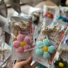 Our puff flower keychains are perfect for gifting. Here they are, beautifully packaged with "Happy Birthday" and "Happy Anniversary" cards. It's a thoughtful, handmade gift ready to go.